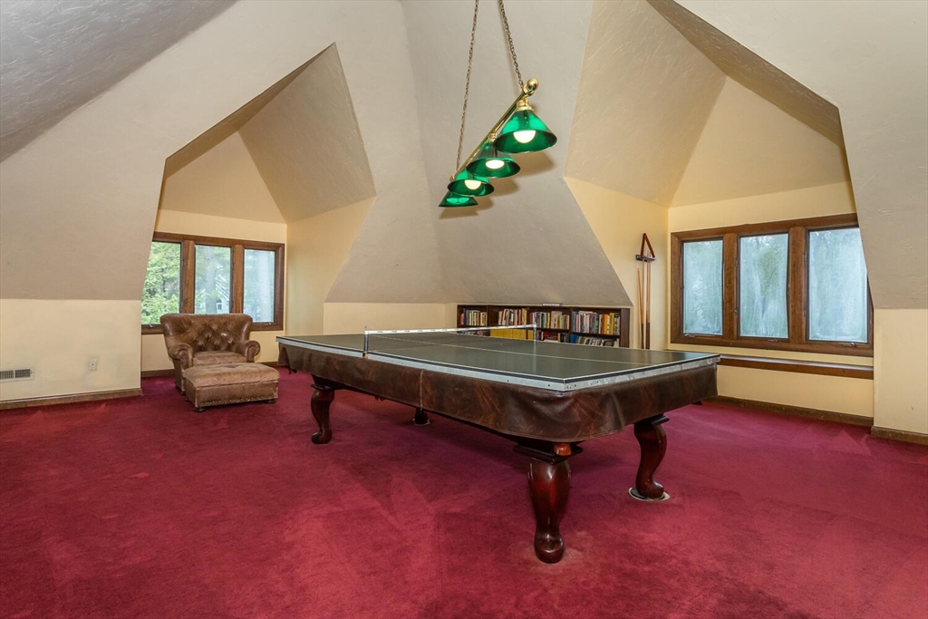 45 Strawberry Lane Canton, MA 02021 - Photo 22 of 32 a living room with furniture a rug and a window