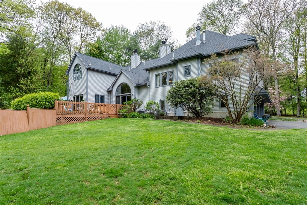 45 Strawberry Lane Canton, MA 02021 - Photo 30 of 32 a view of a house with backyard and sitting area