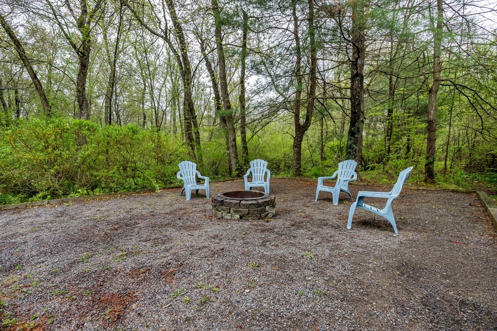 45 Strawberry Lane Canton, MA 02021 - Photo 32 of 32 a view of a bench in a backyard