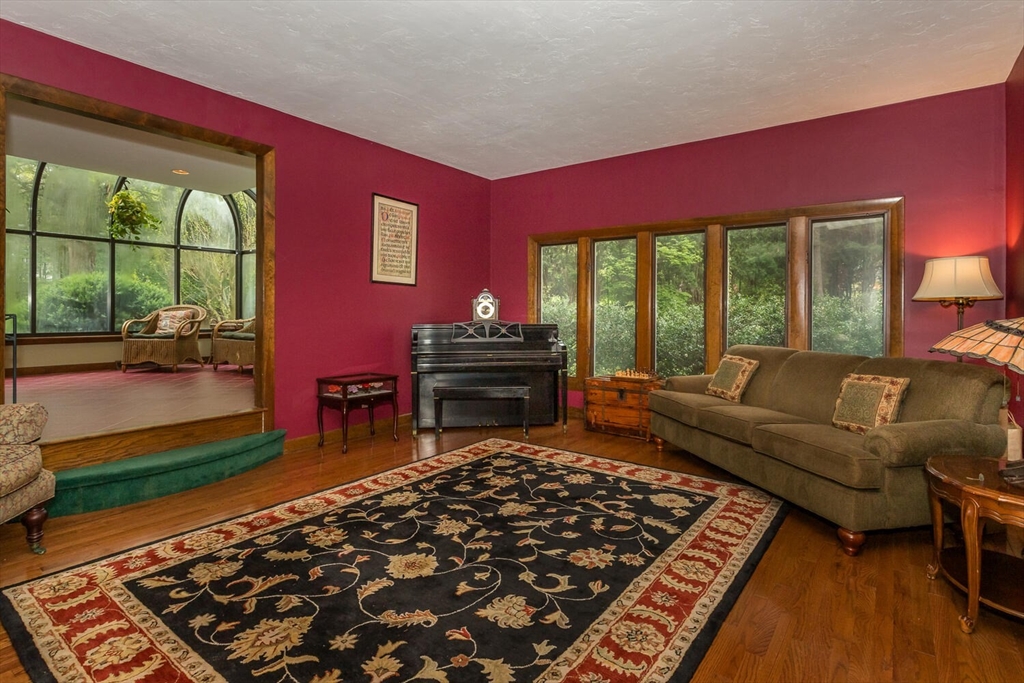 45 Strawberry Lane Canton, MA 02021 - Photo 5 of 32 a living room with furniture and a rug