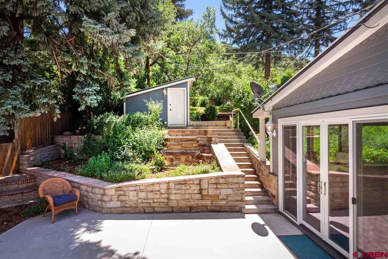 1404 East 3rd Avenue Durango, CO 81301 - Photo 22 of 24 a view of a backyard with sitting area