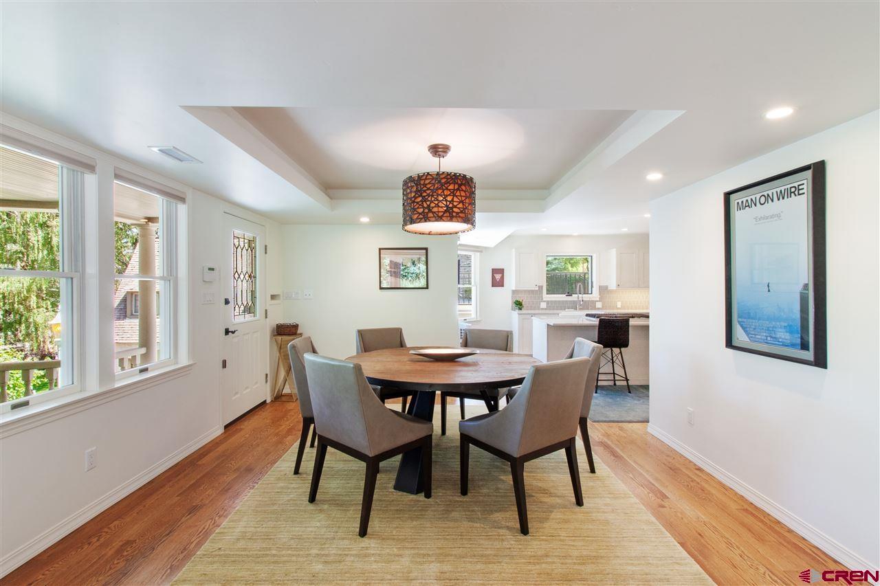 1404 East 3rd Avenue Durango, CO 81301 - Photo 6 of 24 a view of a dining room with furniture window and wooden floor