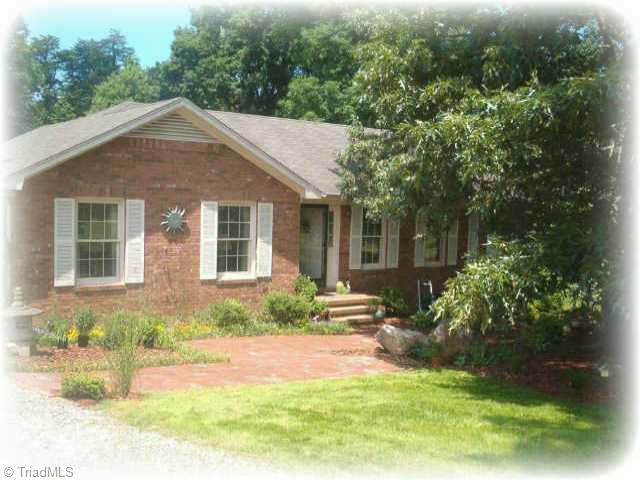 6513 Zack Road Oak Ridge, NC 27310 - Photo 1 of 9 Exterior Front.