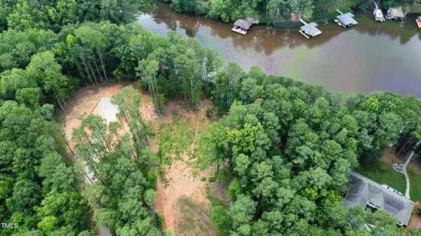 an aerial view of a house with a swimming pool