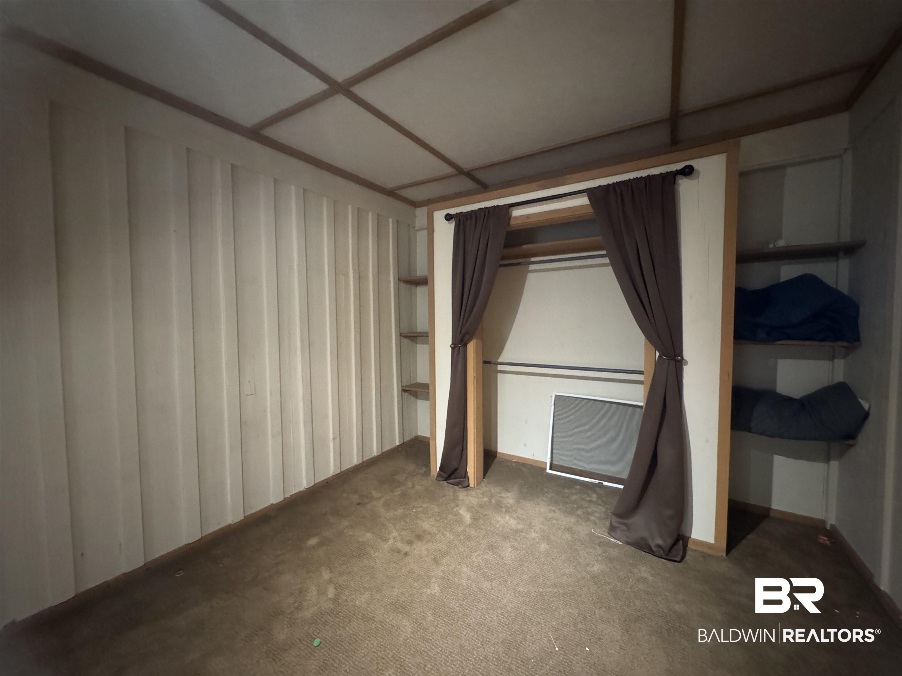 3097 Old Castleberry Road Brewton, AL 36426 - Photo 47 of 49 Unfurnished bedroom featuring a closet