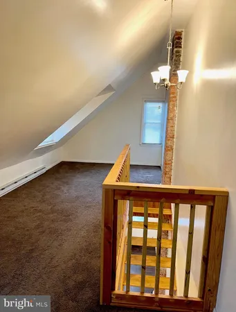 an empty room with a staircase