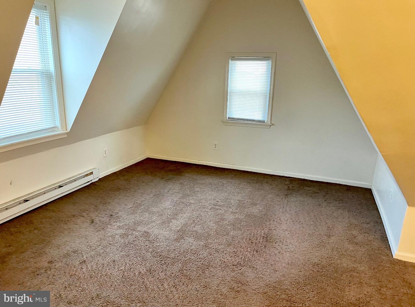 2213 Wakeling Street Philadelphia, PA 19137 - Photo 7 of 8 an empty room with a staircase