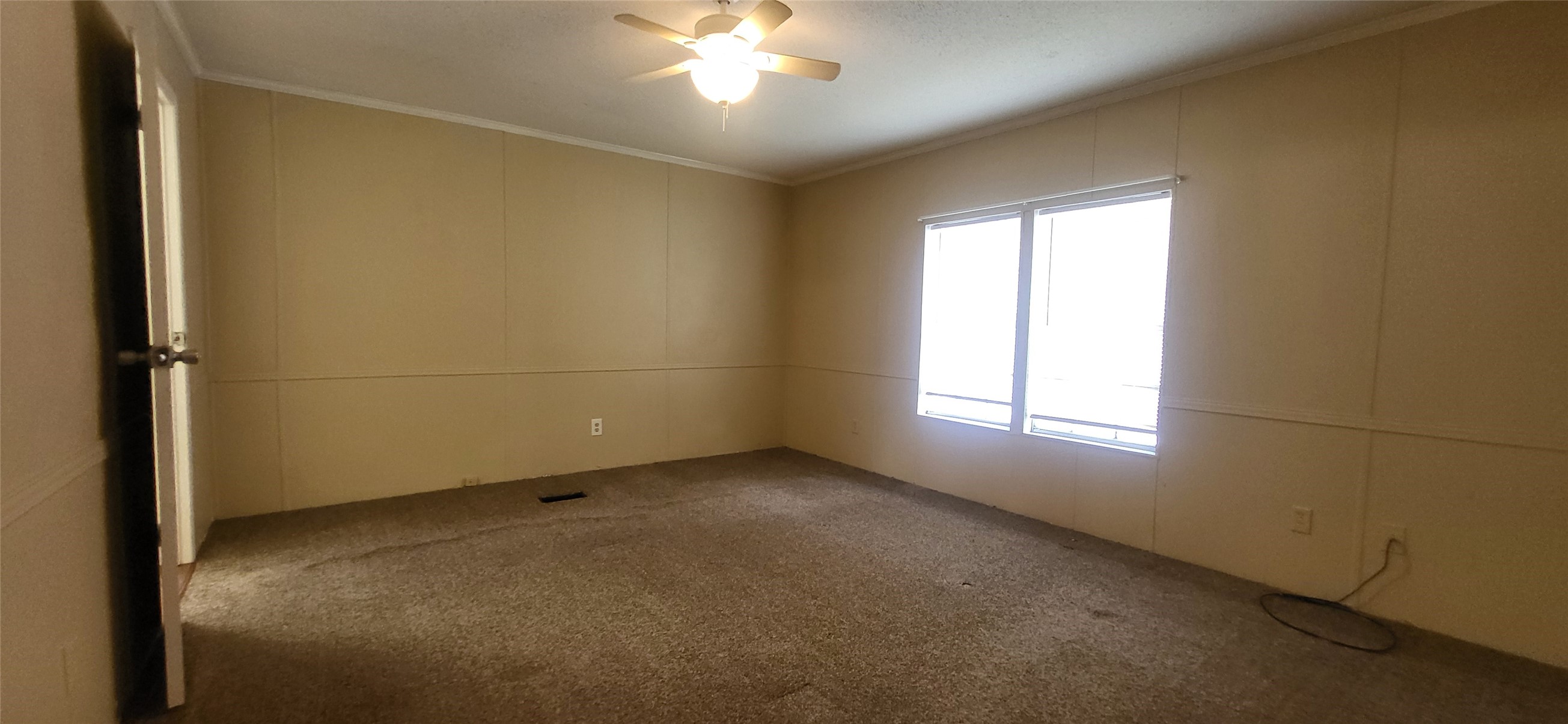 16711 Lake Circle Conroe, TX 77302 - Photo 11 of 20 an empty room with a empty space and windows