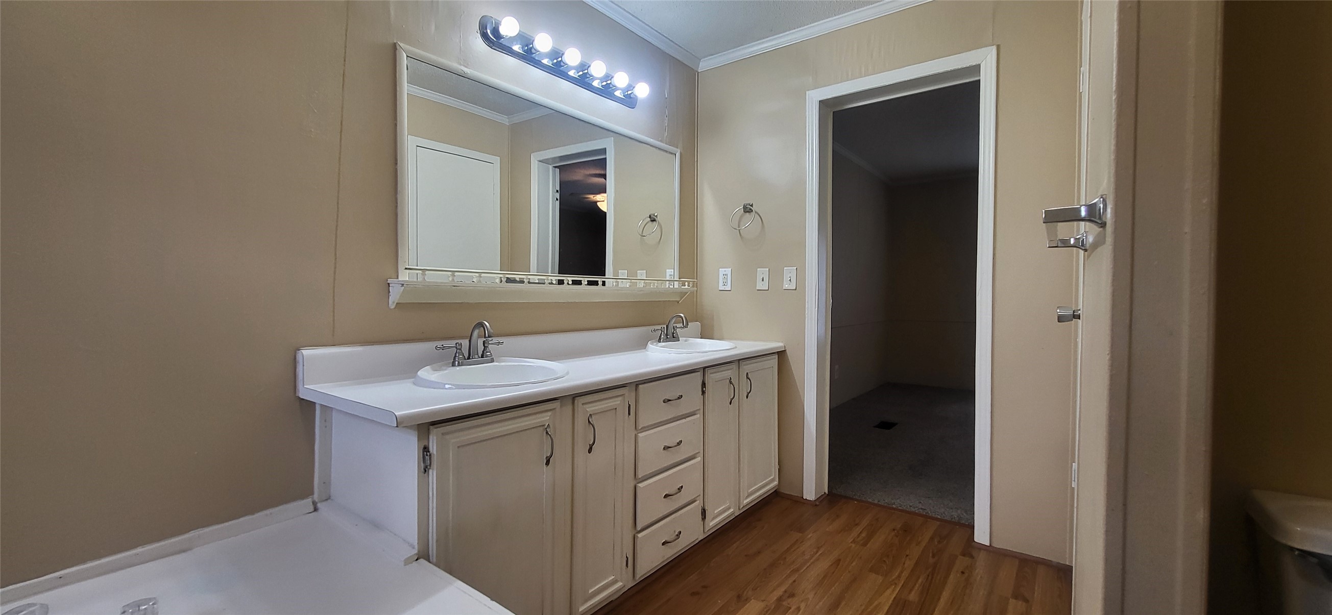16711 Lake Circle Conroe, TX 77302 - Photo 14 of 20 a spacious bathroom with a double vanity sink and a mirror