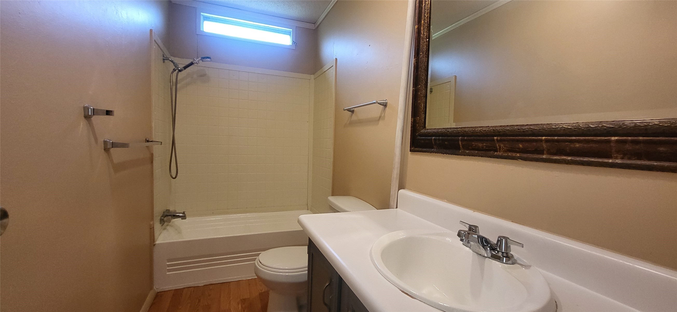 16711 Lake Circle Conroe, TX 77302 - Photo 17 of 20 a bathroom with a sink a toilet and shower