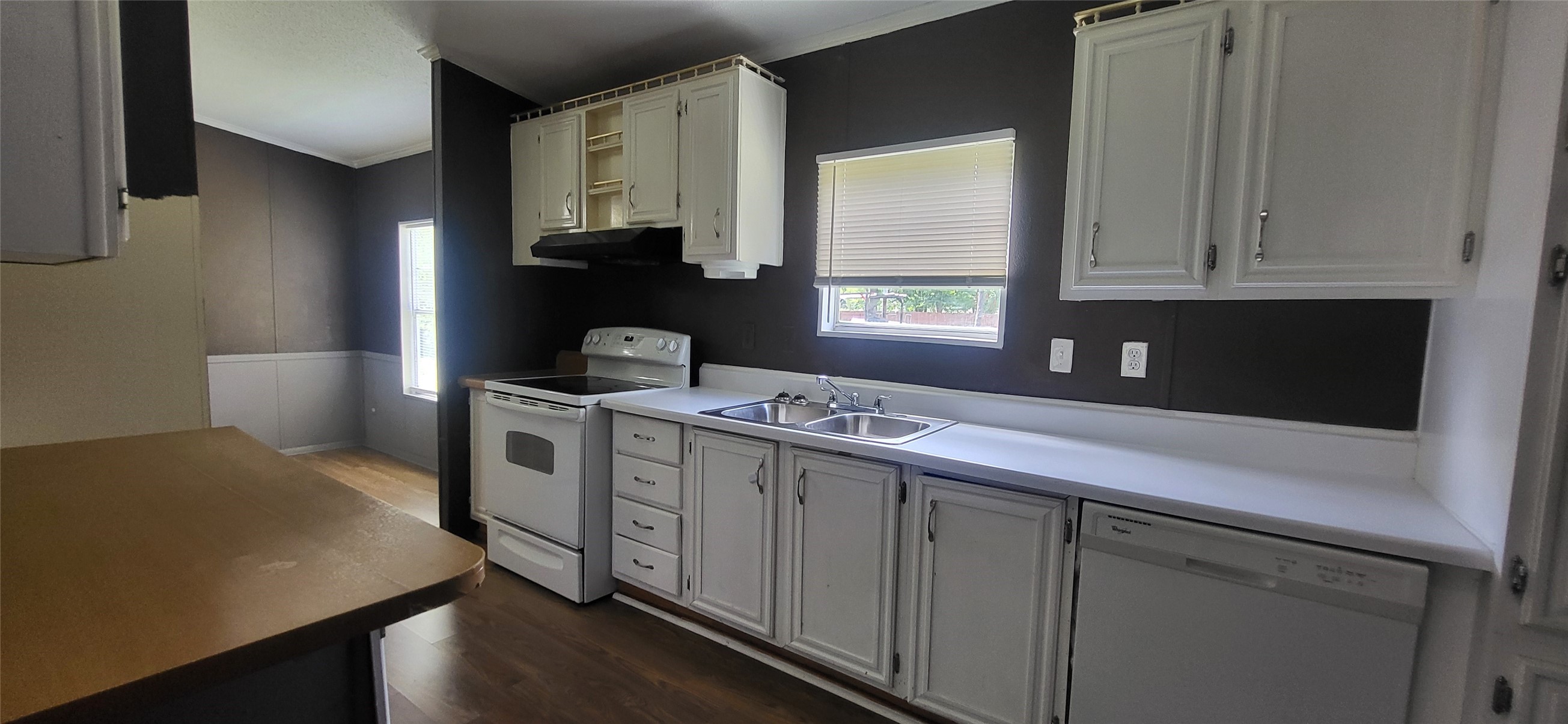 16711 Lake Circle Conroe, TX 77302 - Photo 9 of 20 a kitchen with a sink cabinets and window
