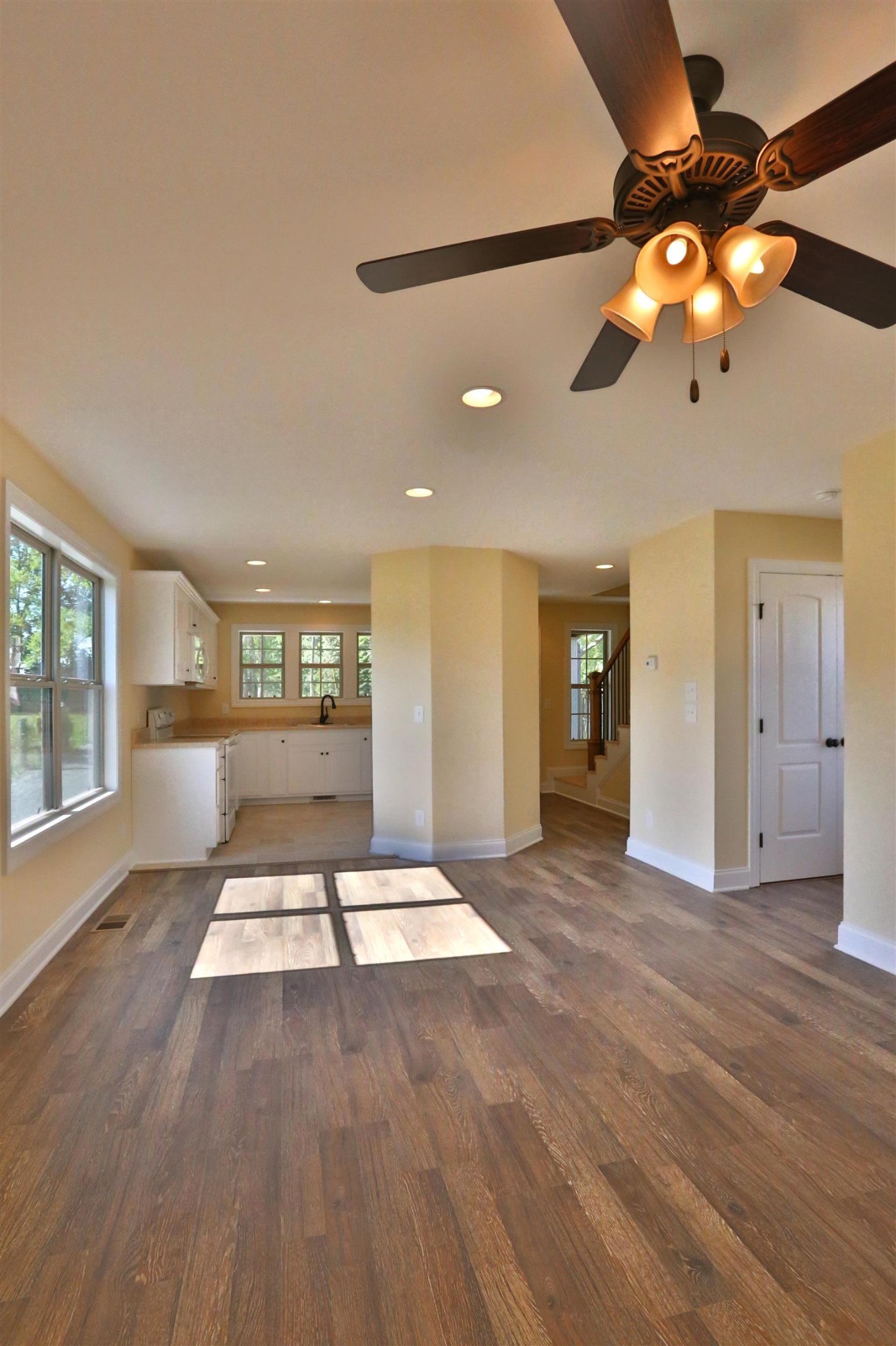 64 Brown Road Lebanon, TN 37087 - Photo 2 of 15 a view of an empty room with window and wooden floor