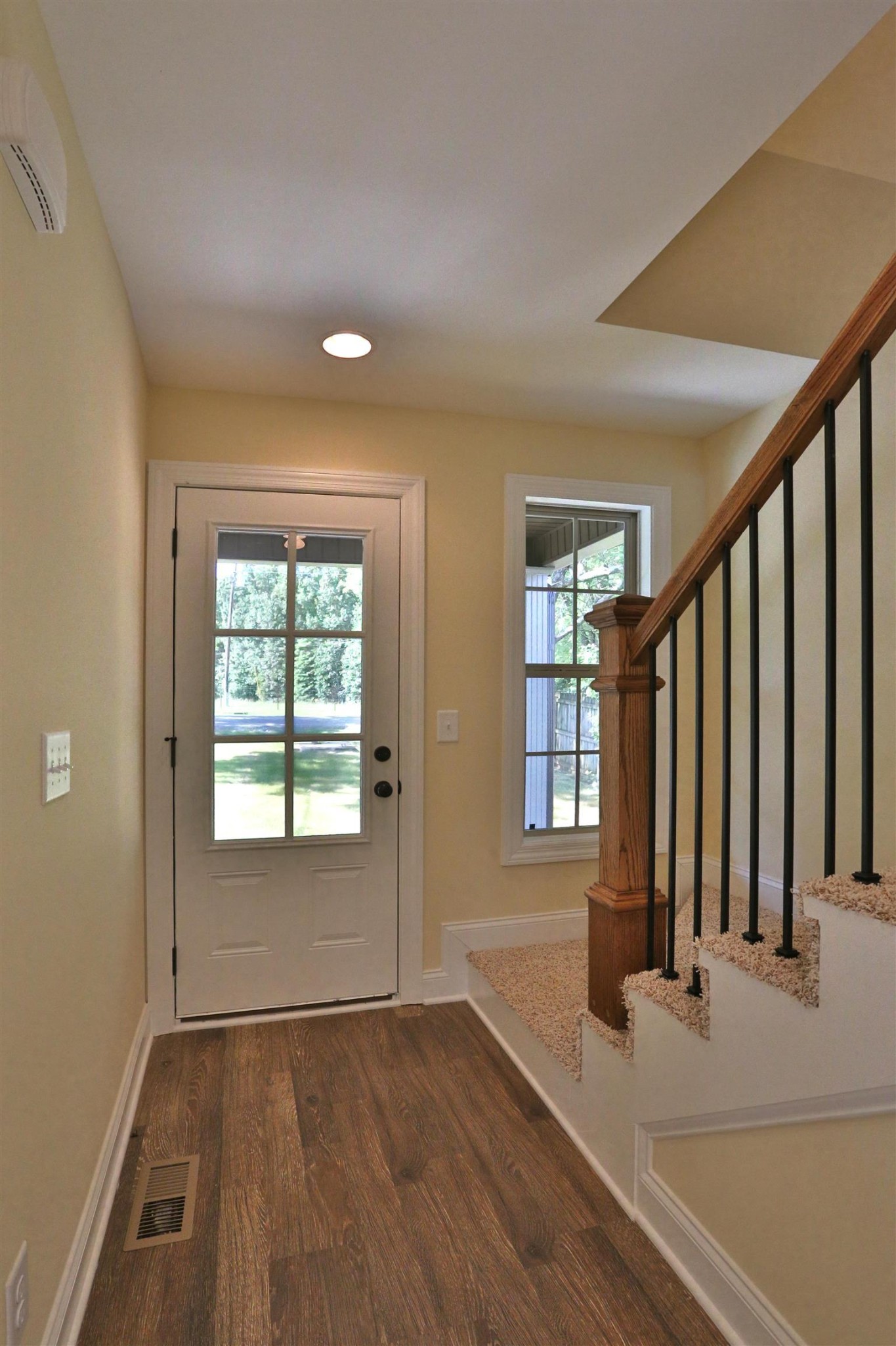 64 Brown Road Lebanon, TN 37087 - Photo 3 of 15 an empty room with wooden floor and windows