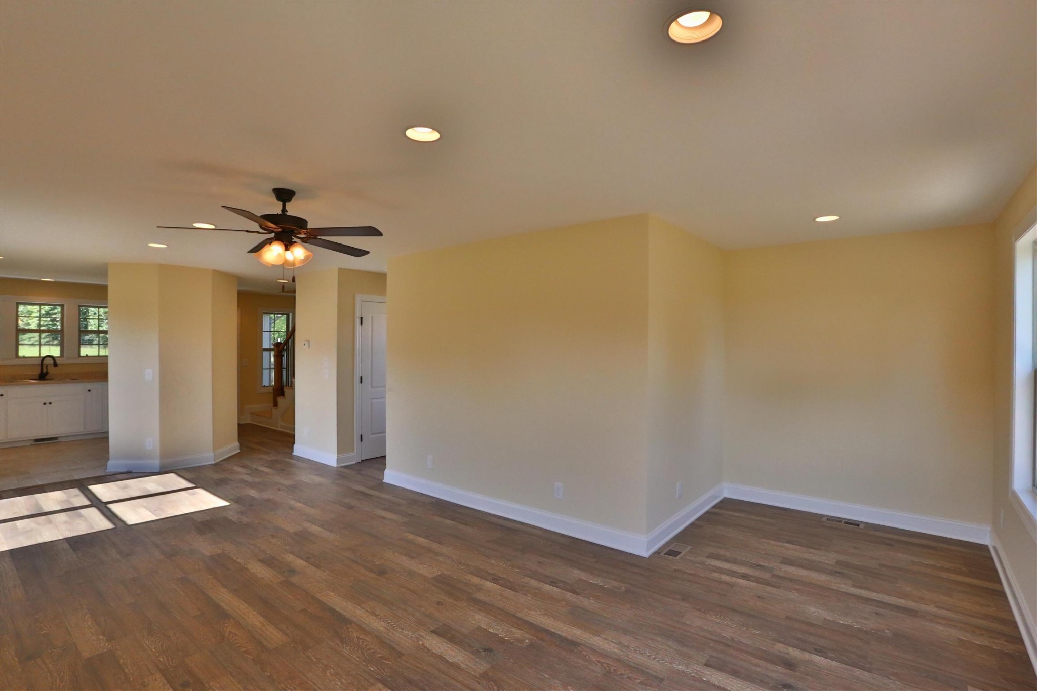 64 Brown Road Lebanon, TN 37087 - Photo 4 of 15 wooden floor in an empty room with a window