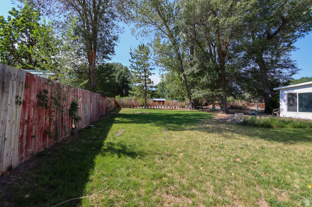 270 East 100 North Monroe, UT 84754 - Photo 42 of 65 Expansive grass yard with a perimeter fence