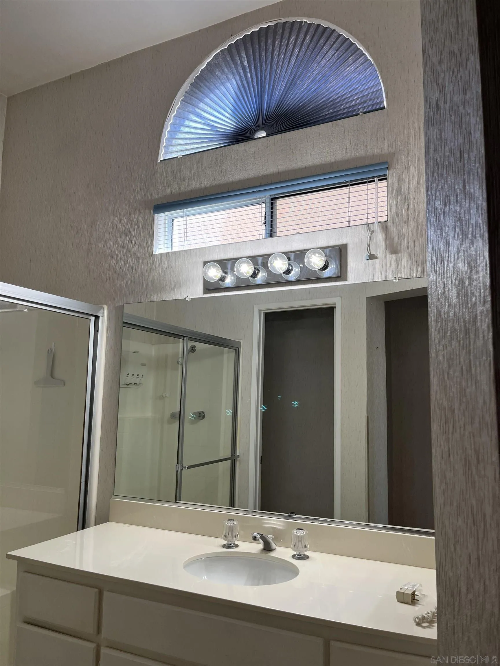 857 Pauma Valley Road Banning, CA 92220 - Photo 8 of 20 a bathroom with a sink and a mirror