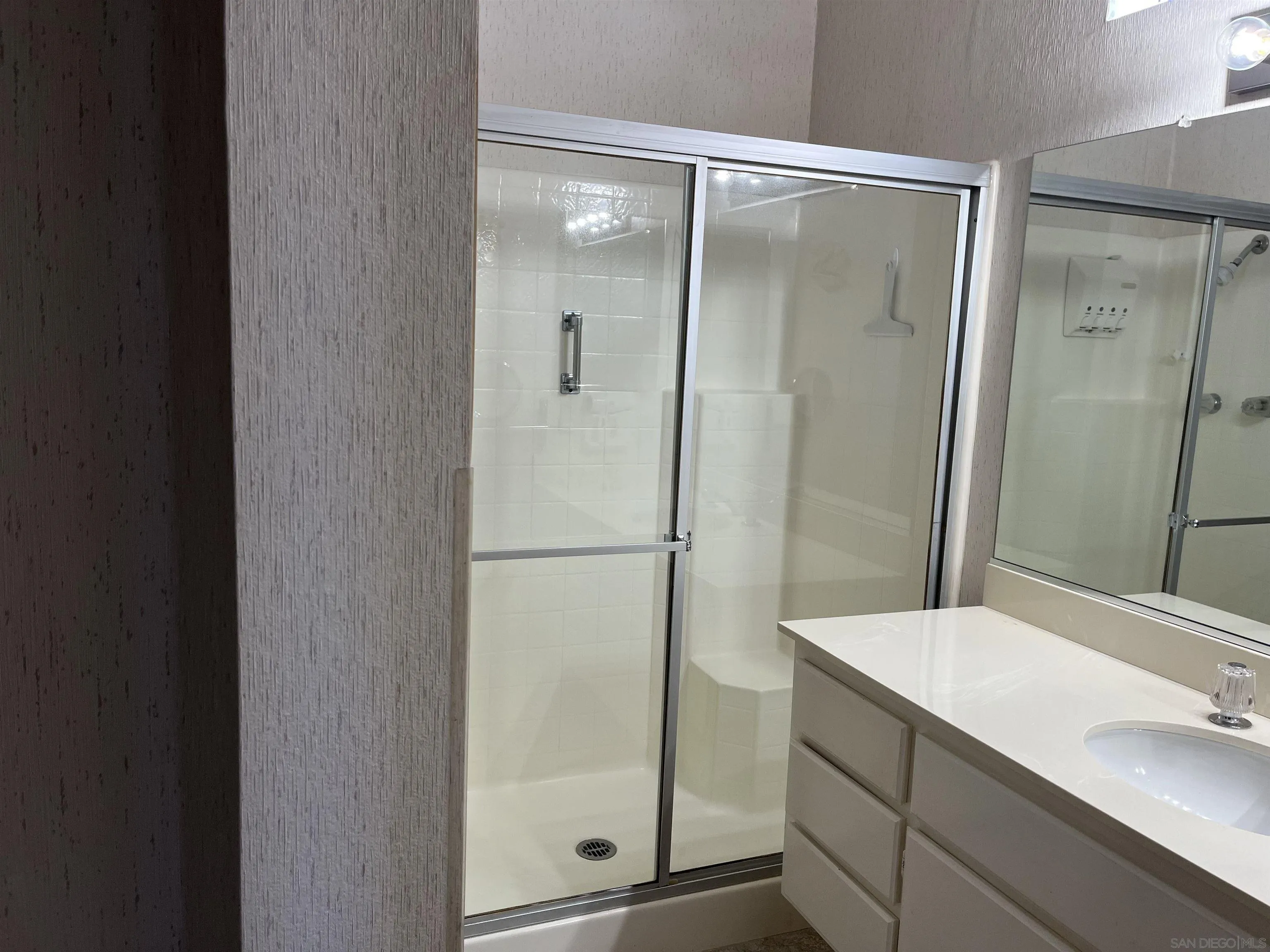 857 Pauma Valley Road Banning, CA 92220 - Photo 9 of 20 a bathroom with a shower and a sink