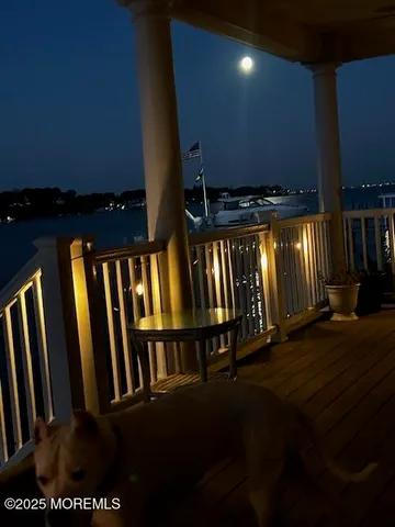 a bedroom with two beds and a couch