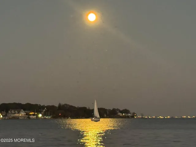 a view of lake and mountain