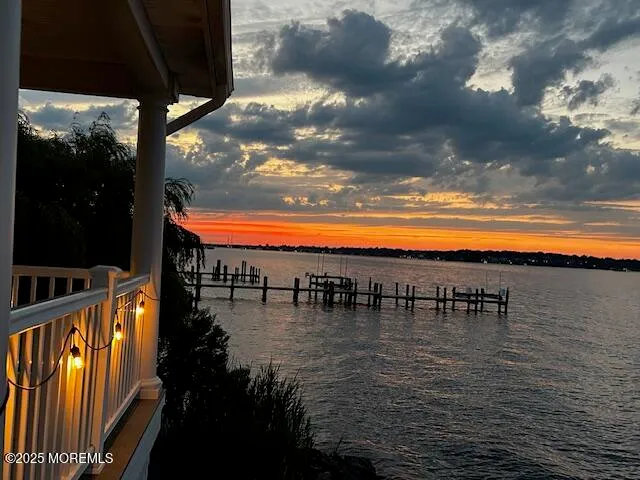 a view of swimming pool from a balcony