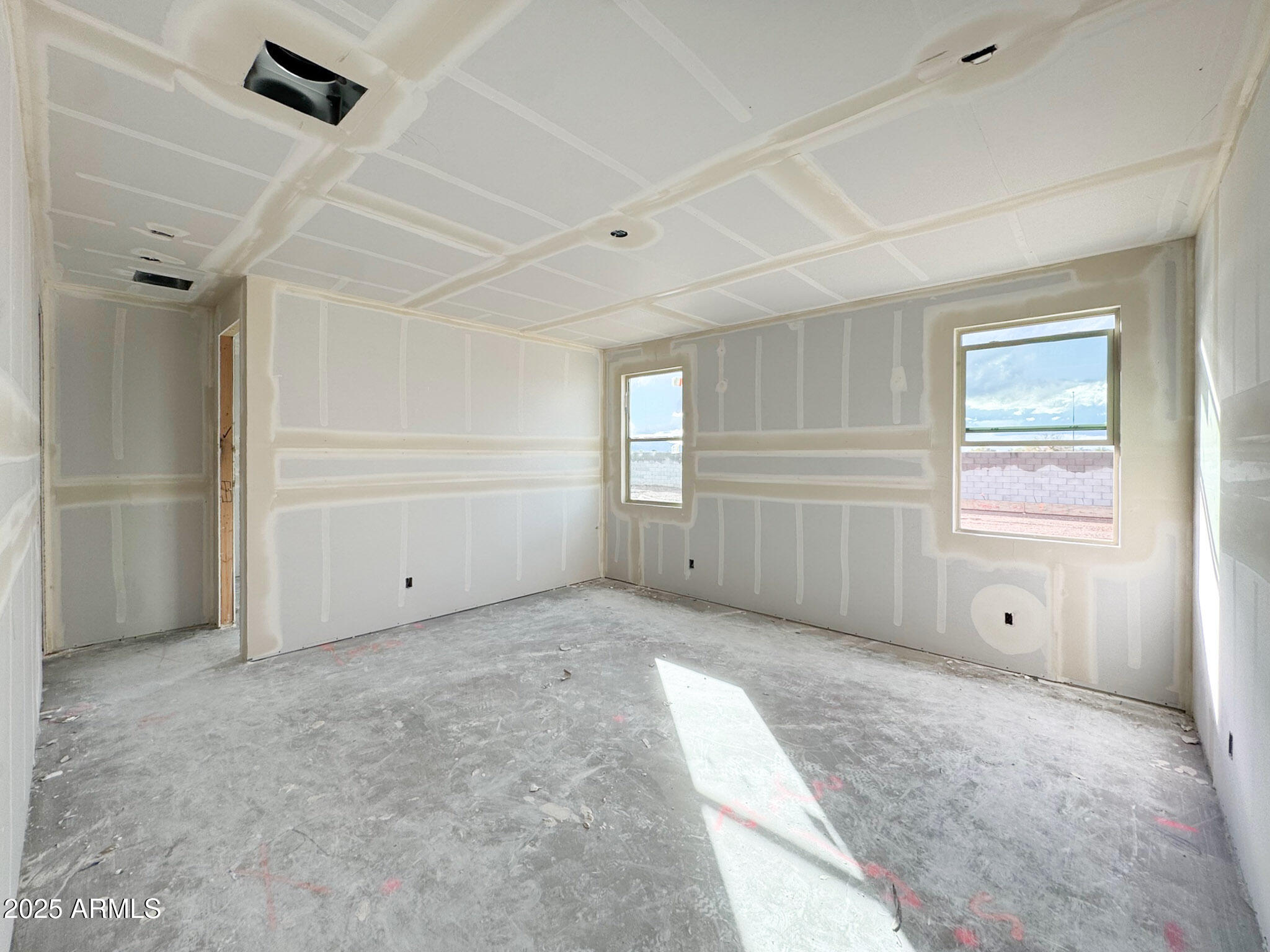 16225 West Bajada Road Surprise, AZ 85387 - Photo 6 of 18 a view of an empty room with window and closet area