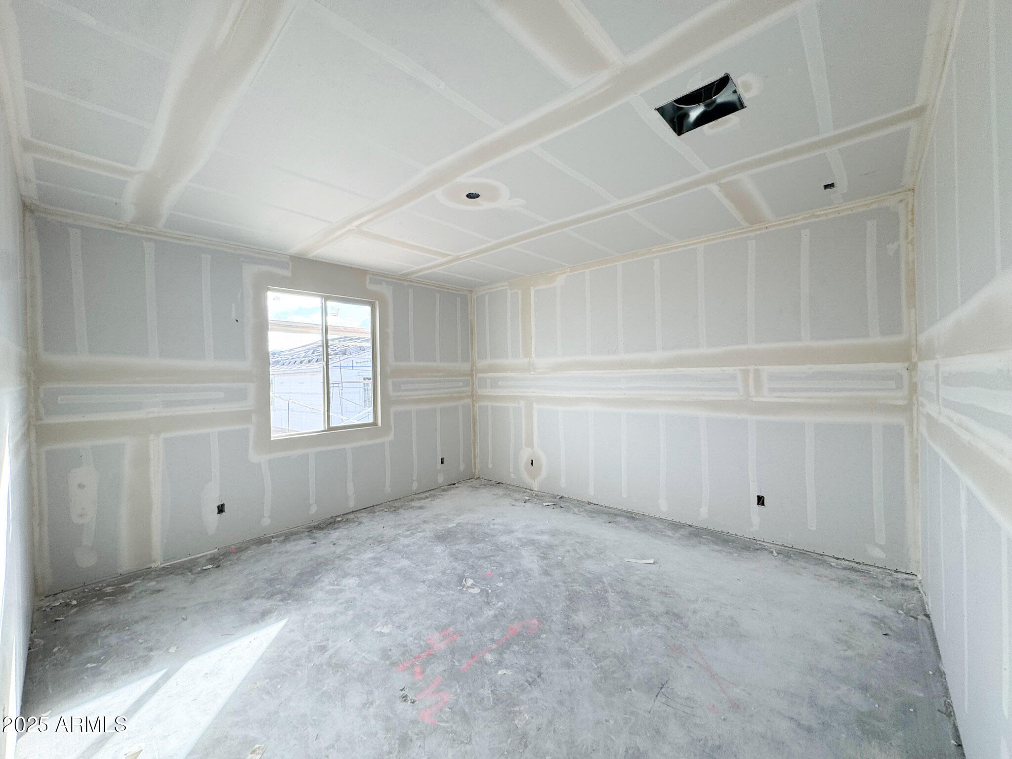 16225 West Bajada Road Surprise, AZ 85387 - Photo 10 of 18 a view of an empty room with a window