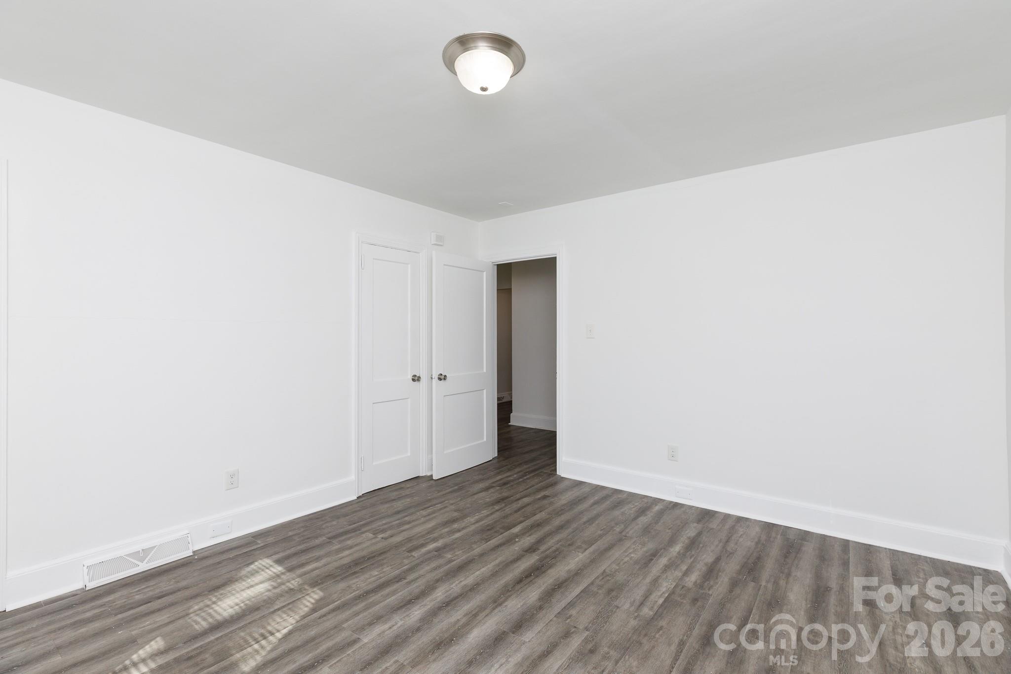 723 Finley Road Rock Hill, SC 29730 - Photo 11 of 22 a view of an empty room with wooden floor