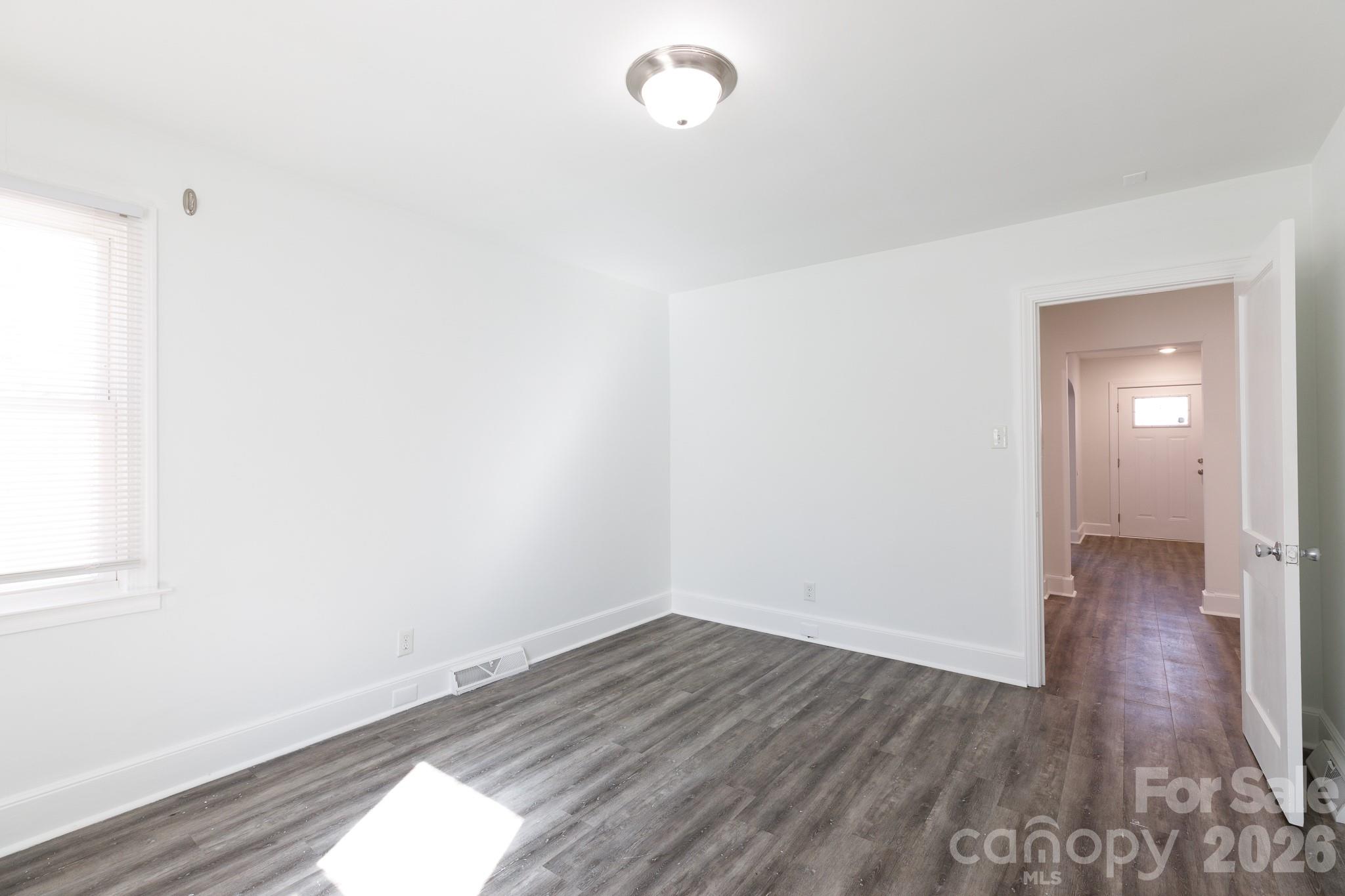 723 Finley Road Rock Hill, SC 29730 - Photo 13 of 22 a view of a room with wooden floor and lamp