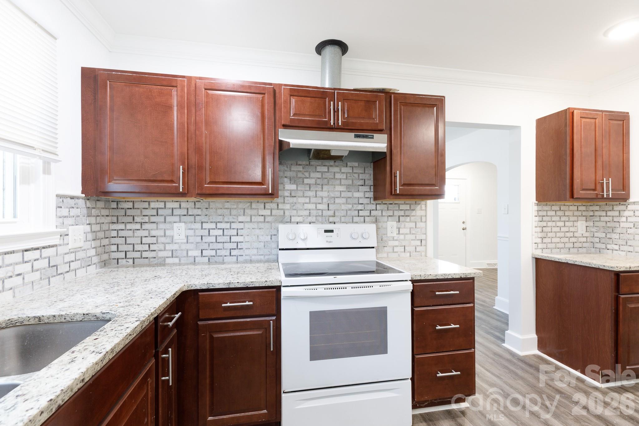 723 Finley Road Rock Hill, SC 29730 - Photo 7 of 22 a kitchen with stainless steel appliances granite countertop a sink stove and microwave
