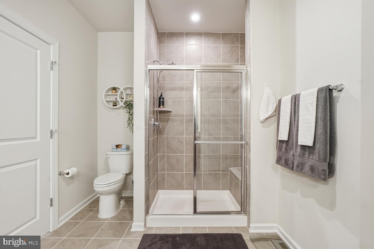 23517 Public House Road, Unit 101 Clarksburg, MD 20871 - Photo 16 of 26 Primary ensuite bathroom with walk in closet
