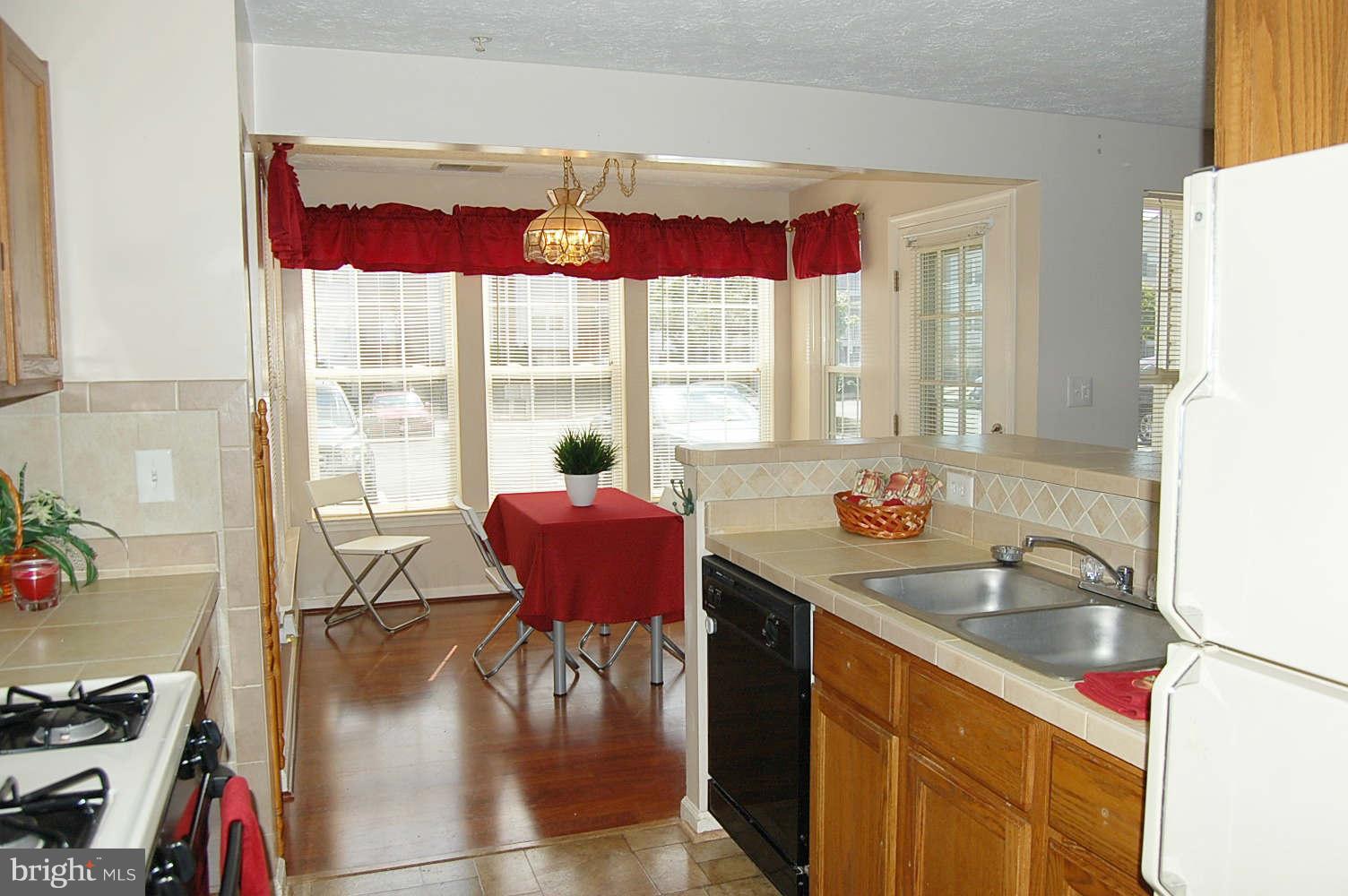 2440 Blue Spring Court, Unit 104 Odenton, MD 21113 - Photo 13 of 21 Kitchen