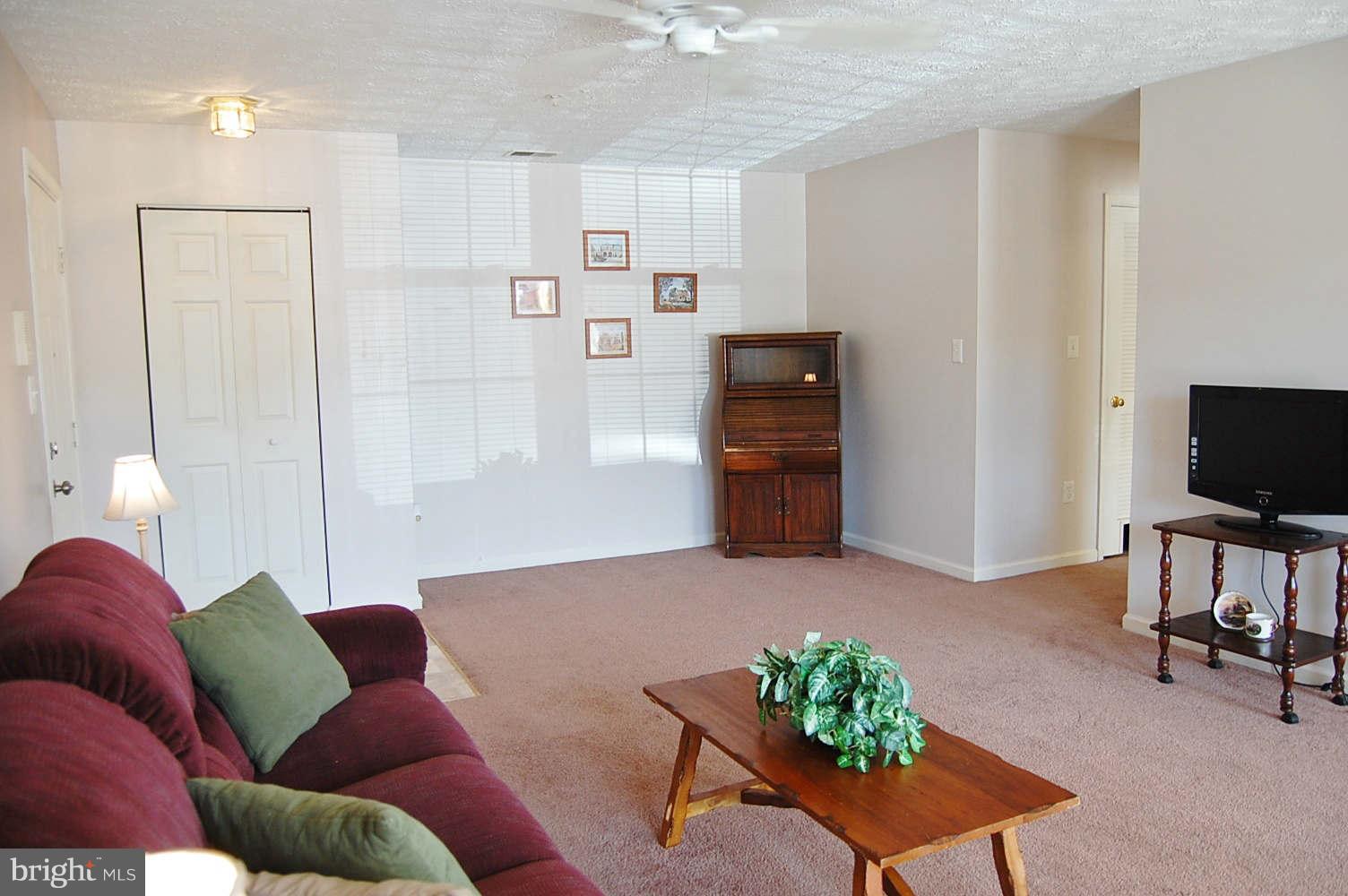 2440 Blue Spring Court, Unit 104 Odenton, MD 21113 - Photo 4 of 21 Living Room
