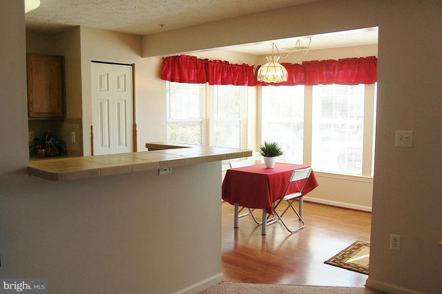 2440 Blue Spring Court, Unit 104 Odenton, MD 21113 - Photo 6 of 21 Sunroom