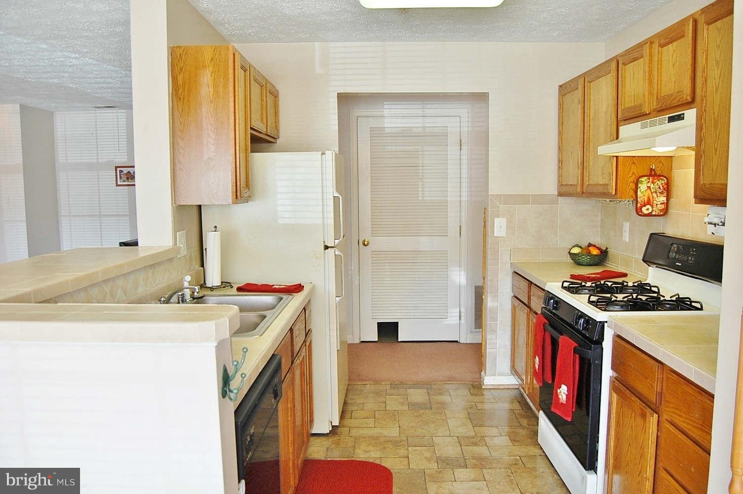 2440 Blue Spring Court, Unit 104 Odenton, MD 21113 - Photo 9 of 21 Kitchen