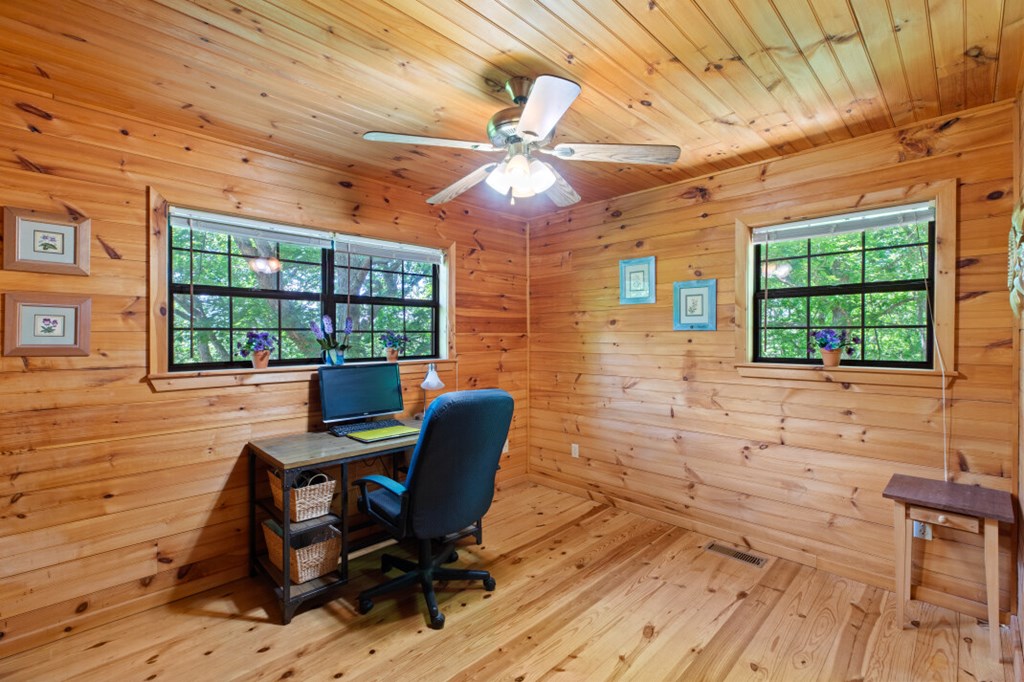 66 Fortenberry Road Young Harris, GA 30582 - Photo 25 of 55 a view of a workspace with furniture and a window