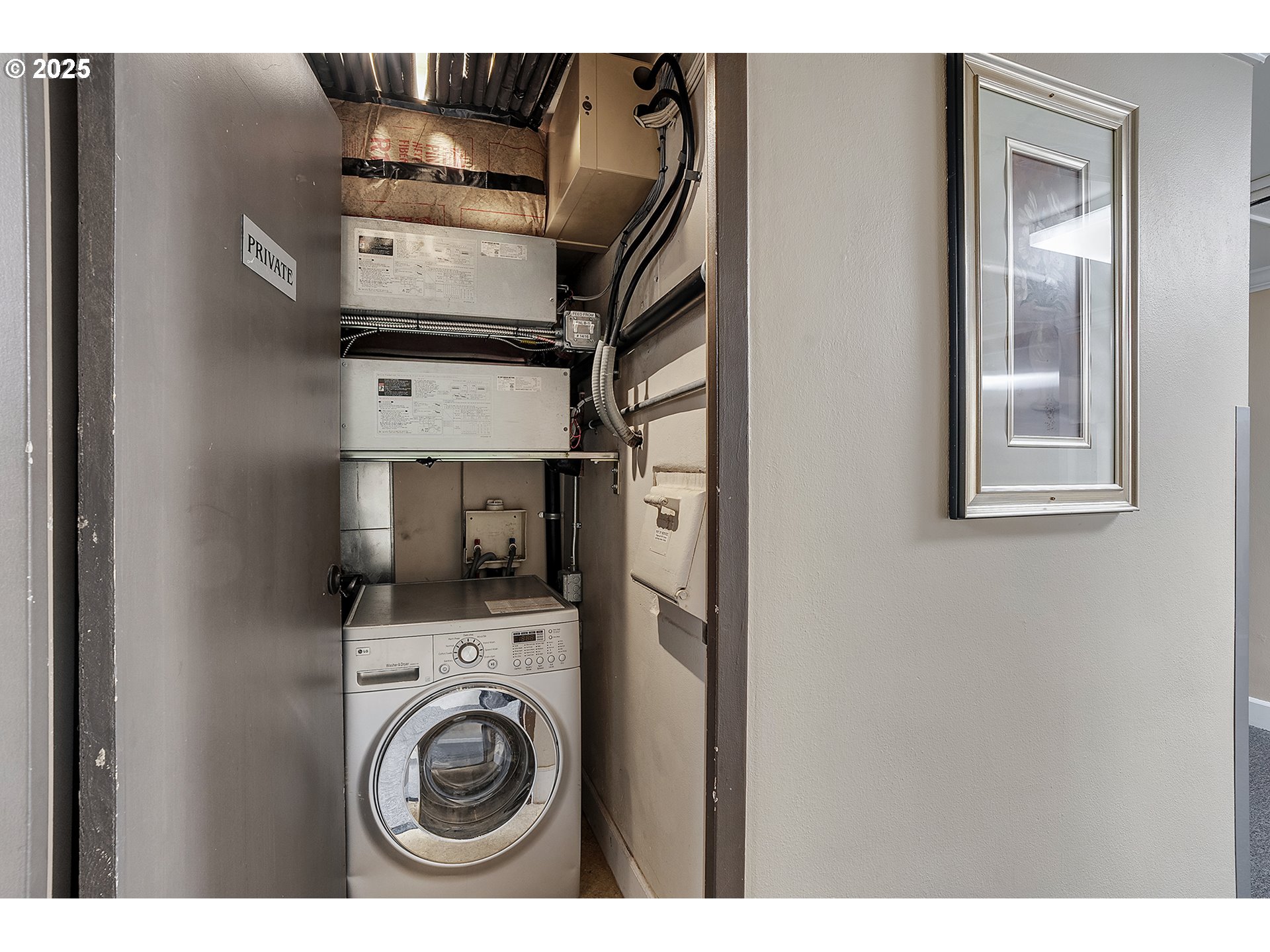 1205 Southwest Cardinell Drive, Unit 704 Portland, OR 97201 - Photo 16 of 23 a utility room with dryer and washer