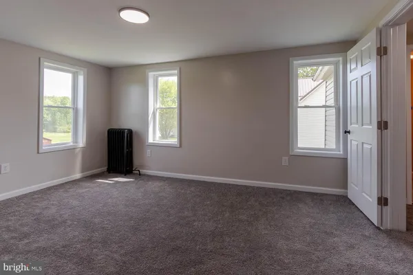 an empty room with windows