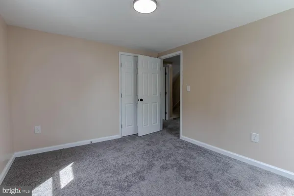 a view of backyard with a deck