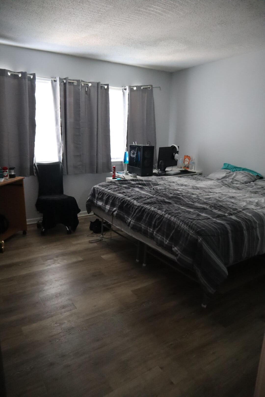 40 11th Street, Unit 99 Shalimar, FL 32579 - Photo 12 of 14 a bedroom with a bed and a window