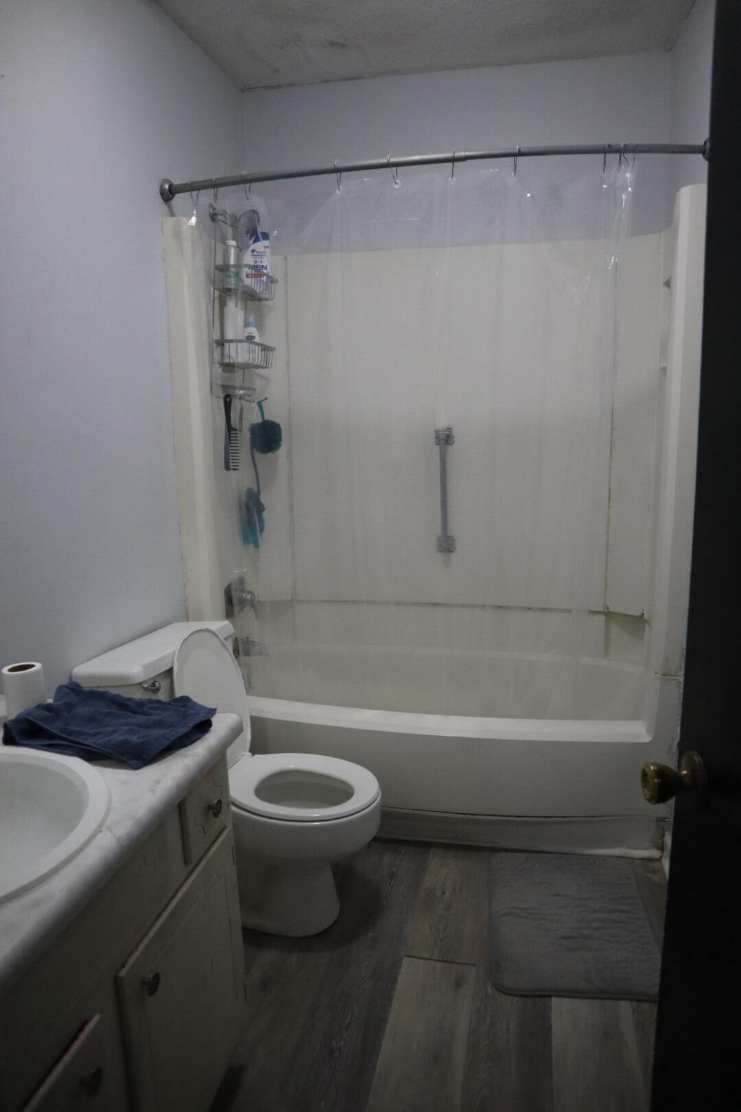 40 11th Street, Unit 99 Shalimar, FL 32579 - Photo 13 of 14 a bath room with a toilet and a bath tub