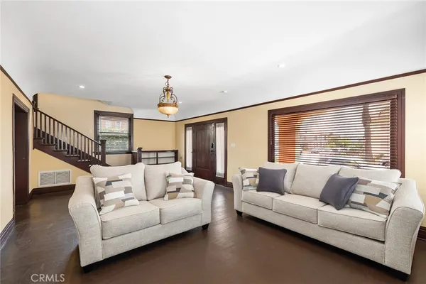 a kitchen with sink and refrigerator