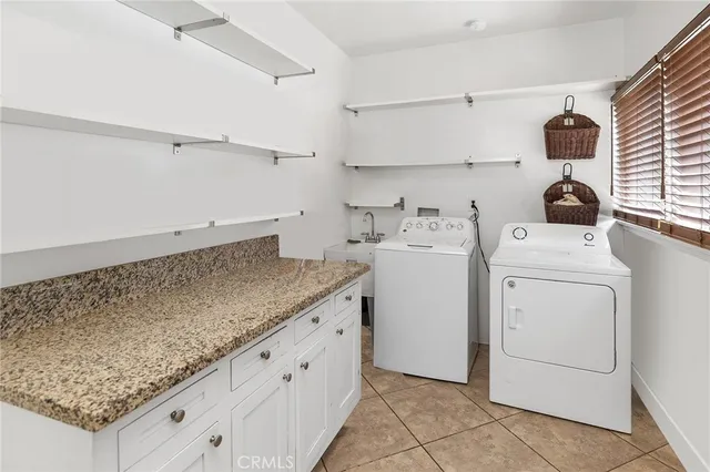 a bedroom with a bed dresser and a window