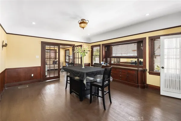 a bathroom with a granite countertop sink mirror and shower