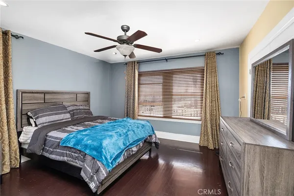 a view of a chair and tables in the patio