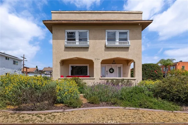 a outdoor space with patio the couches and a potted plant