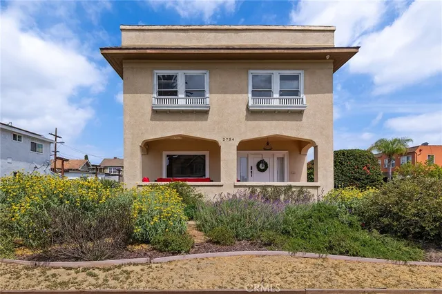 a outdoor space with patio the couches and a potted plant