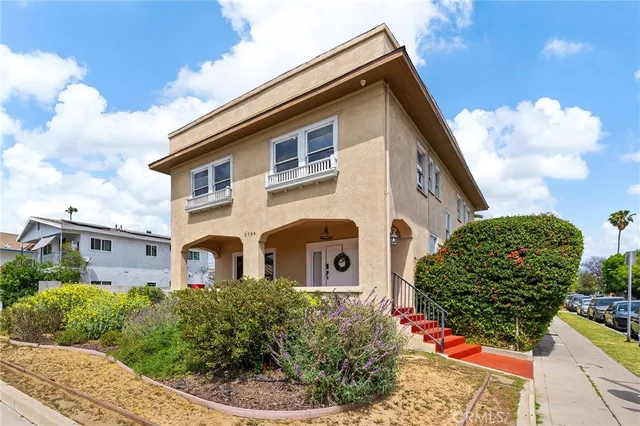 a living room with furniture window and a fireplace