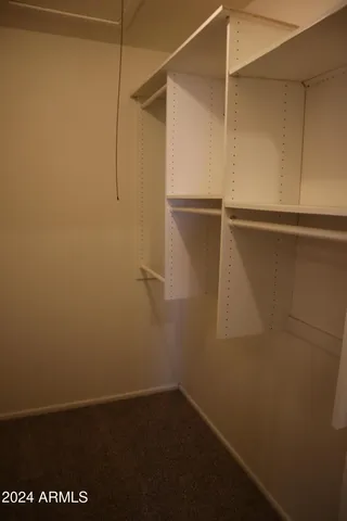 a view of small space with racks on the wall