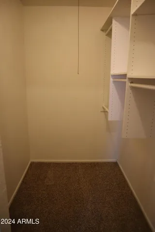 a view of small space with racks on the wall