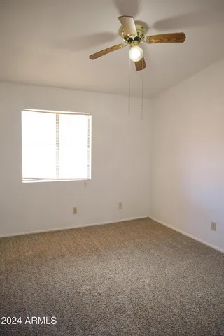 a bathroom with a toilet and a sink